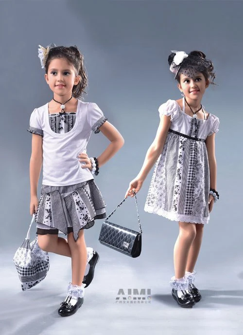 Composite of two black-and-white coordinated looks, a patchwork skort set and a panel sundress