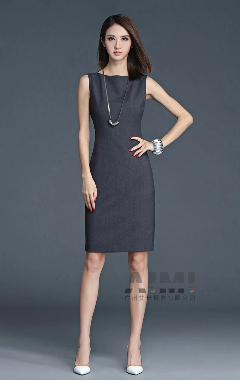 Sleeveless boat-neck sheath dress, hand-on-hip pose with white-toe pumps