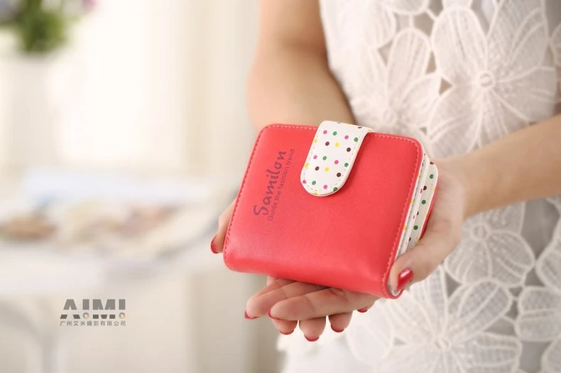 ladies purse scene shooting hand model clutch bag photo show Guangzhou bag shooting company detail shot photography