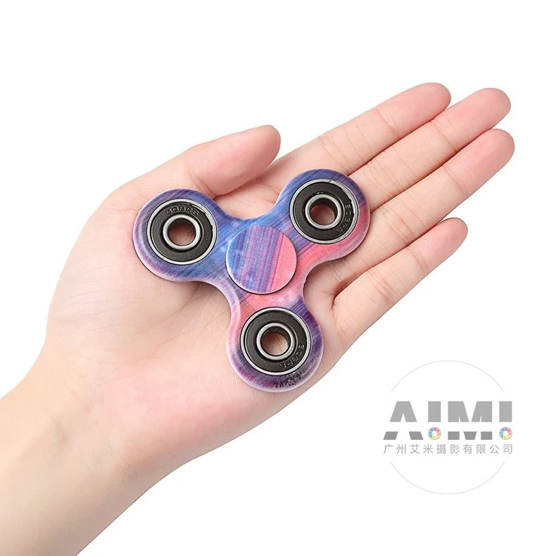 Leisure toys finger gyro flat-lay photography