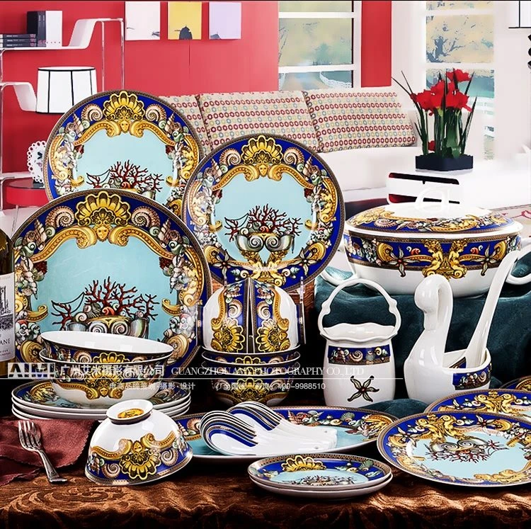 Baroque porcelain dinner set on brocade with red wall - dinner service photography