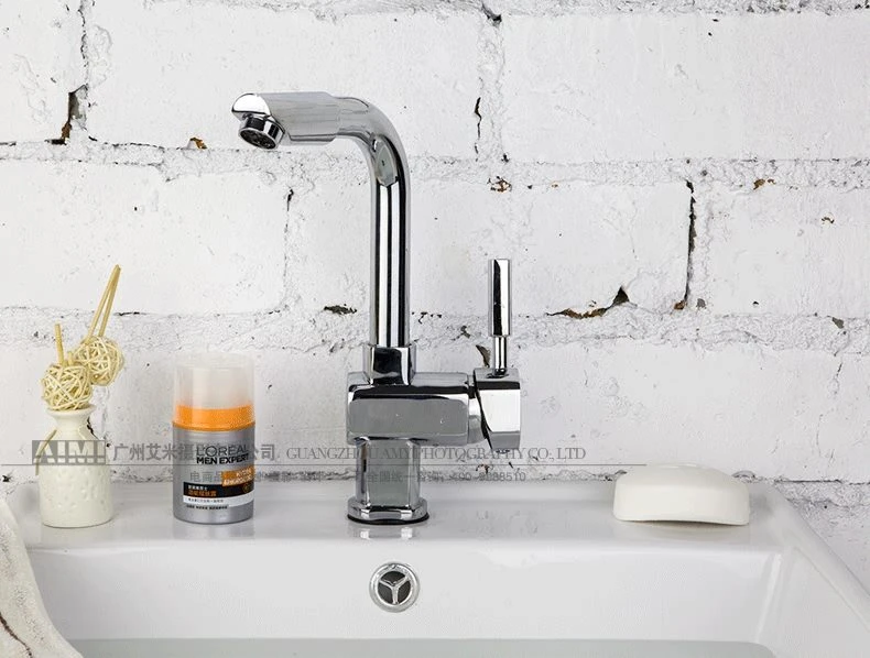 Stainless steel faucet photography gray background wall creative photography perfect shooting effect creative photography