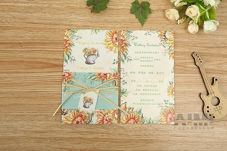 Sunflower invitation suite open with wooden guitar prop flat lay - rustic stationery photography